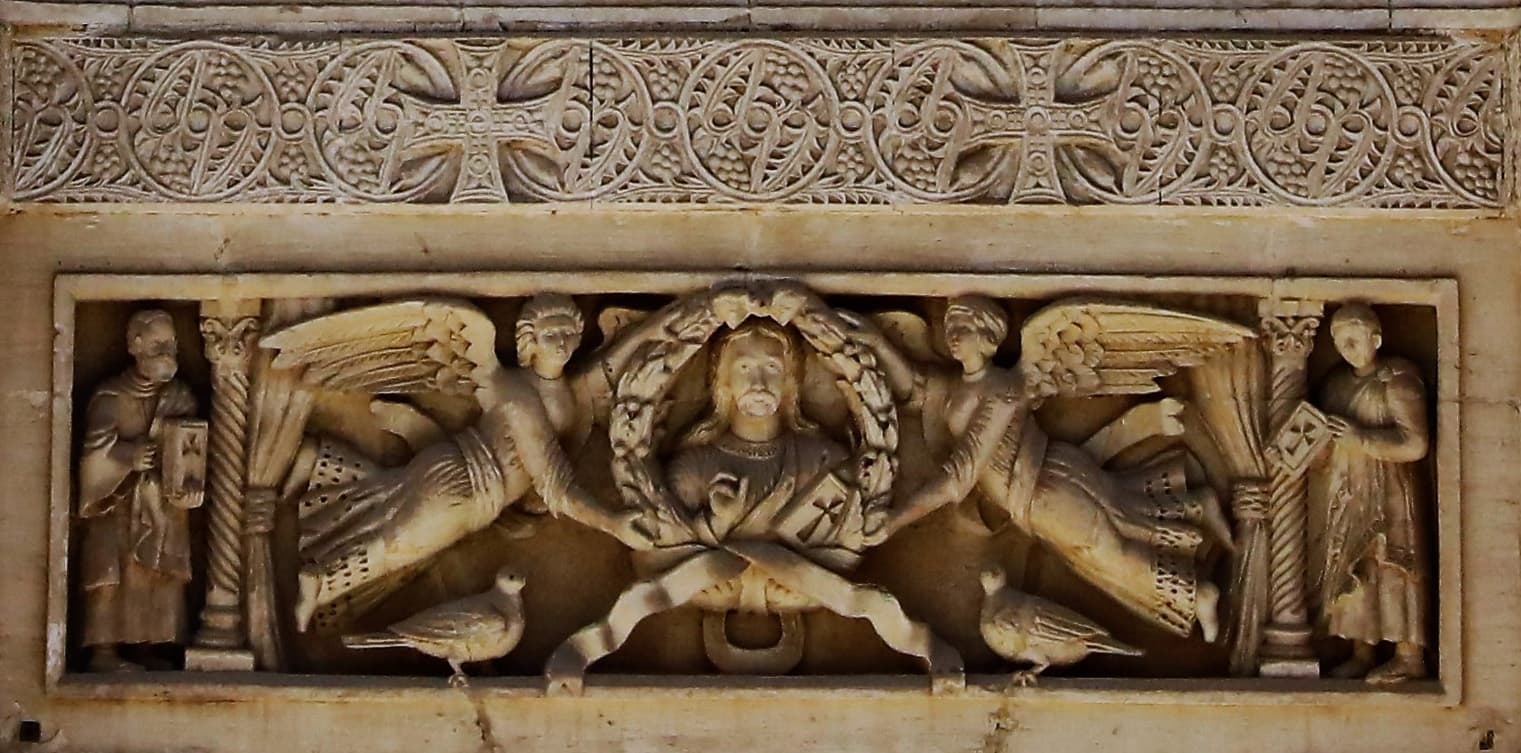 Sculptural view of Jesus carved in stone above t